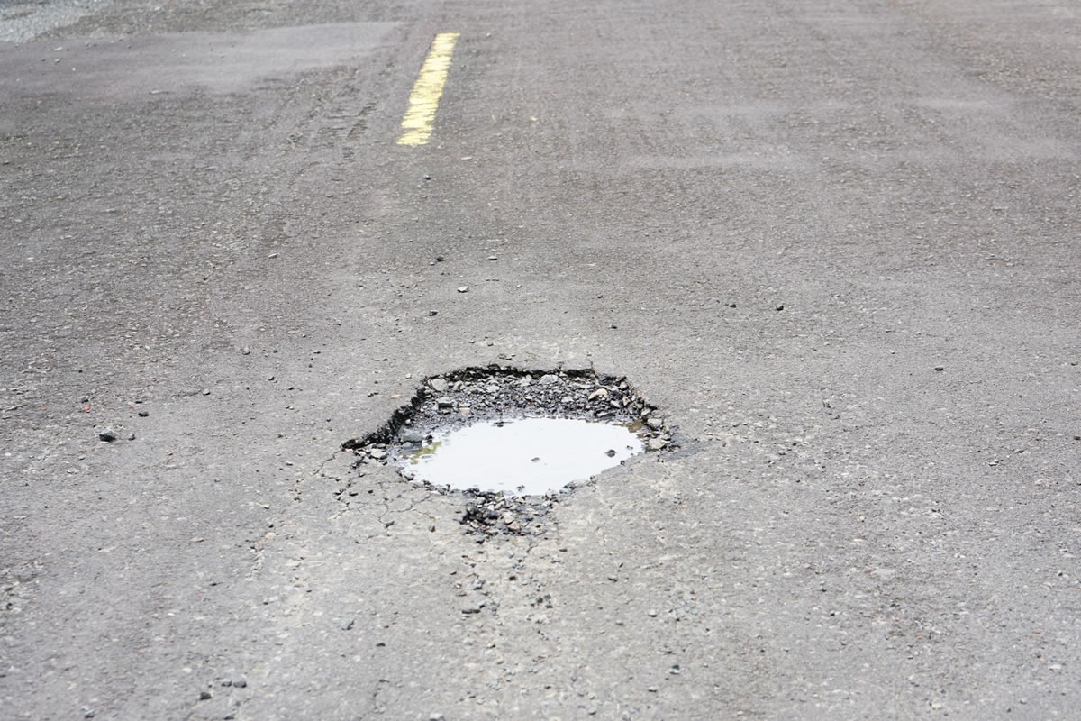 Four Reasons to Repair Commercial Parking Lot Potholes